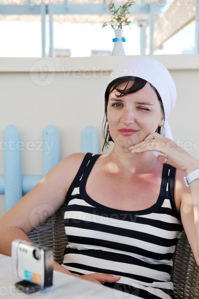 Greek woman on the streets of Oia, Santorini, Greece photo