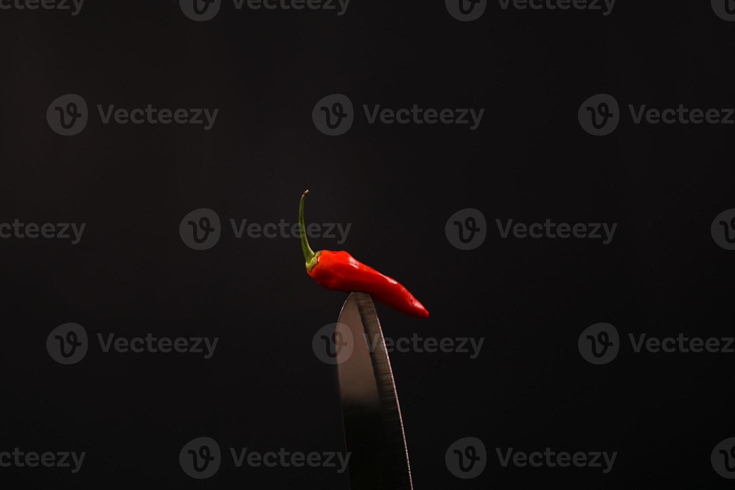premium chili in the bled with black background landscape photo
