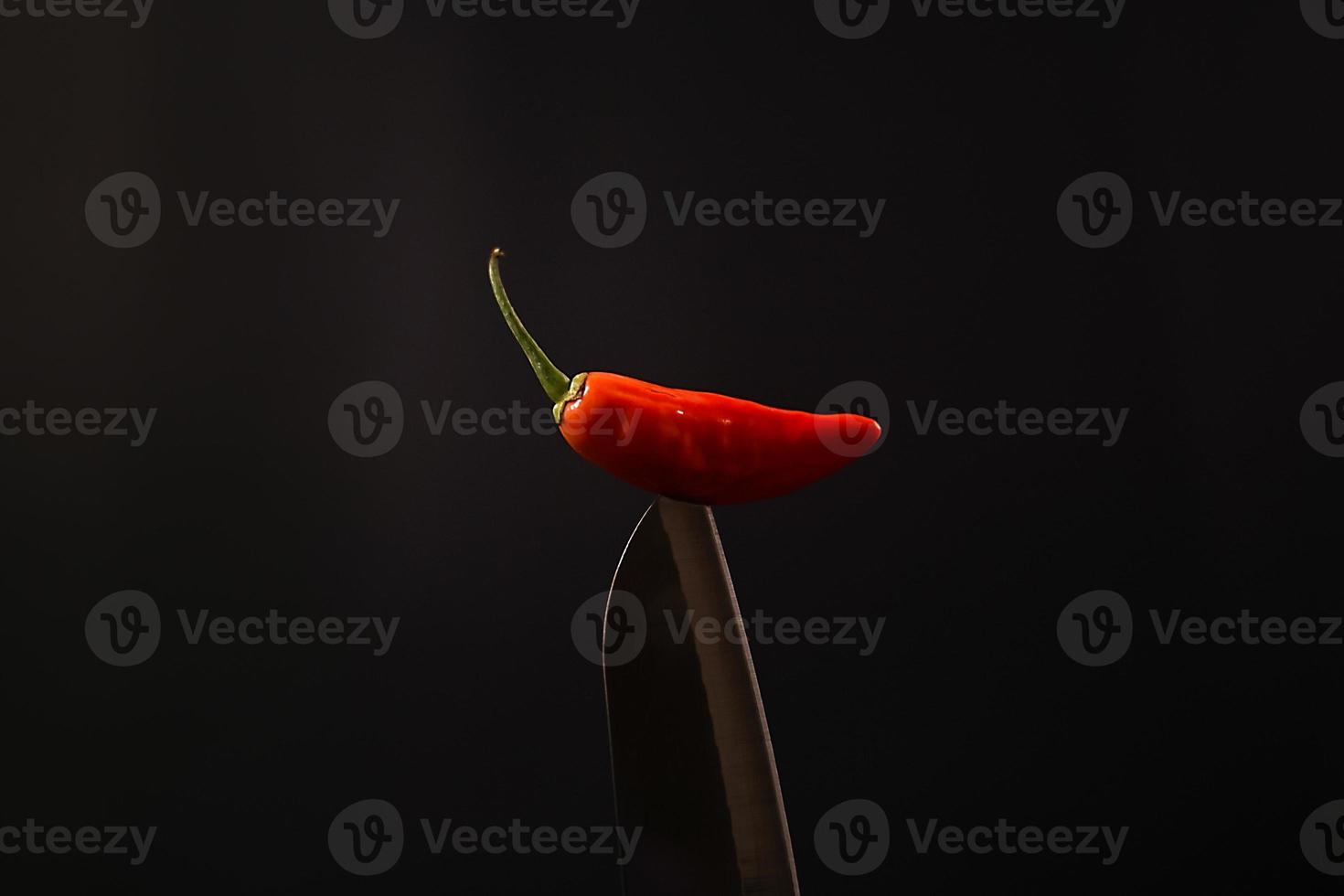 premium chili in the bled with black background landscape photo