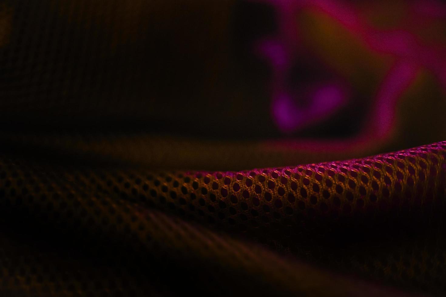 elegant premium gold net cloth abstract texture with black background photo