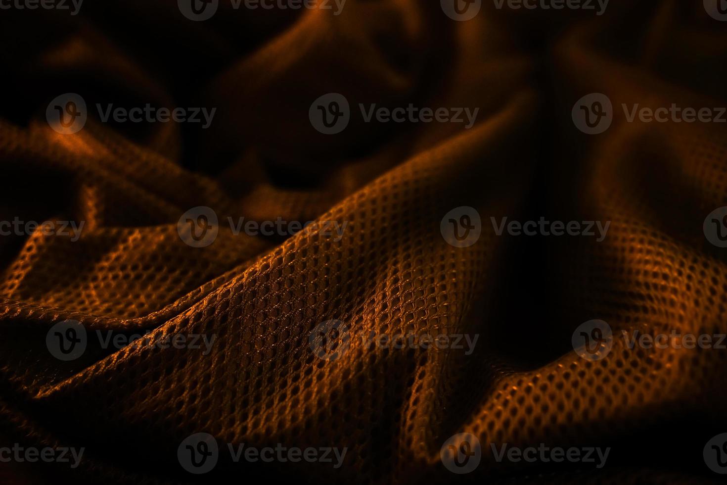 elegant premium gold net cloth abstract texture with black background photo