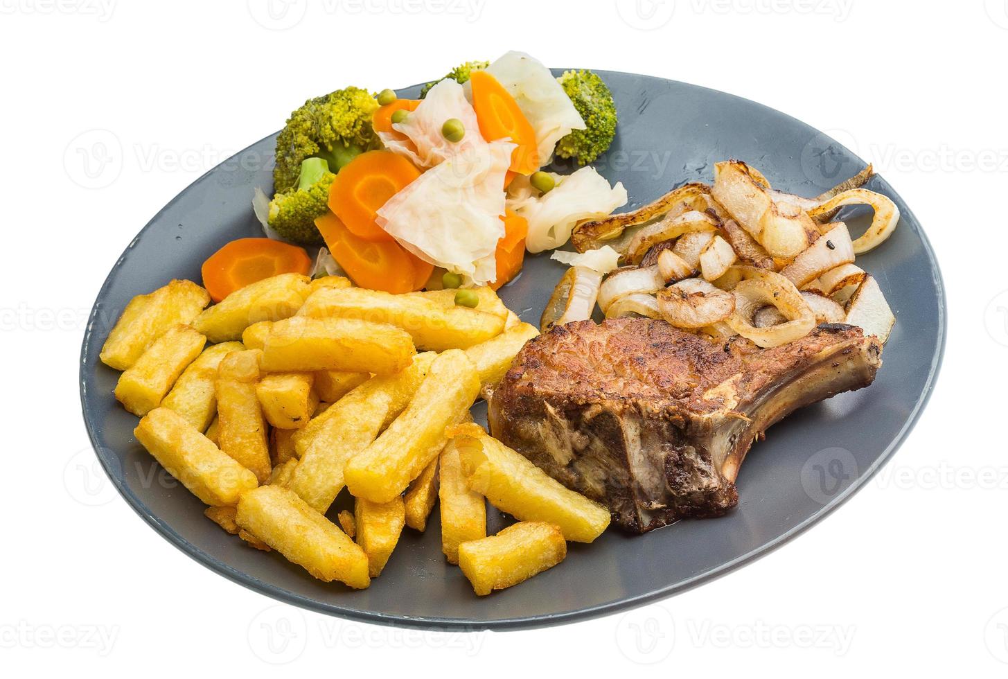 T-bone steak on the plate and white background photo