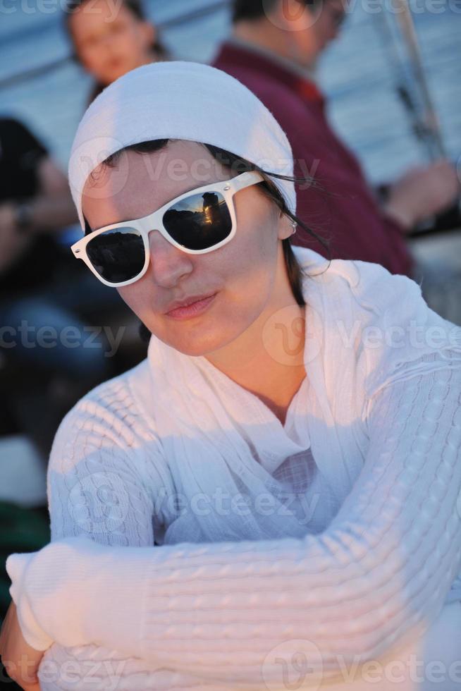 Greek woman on the streets of Oia, Santorini, Greece photo