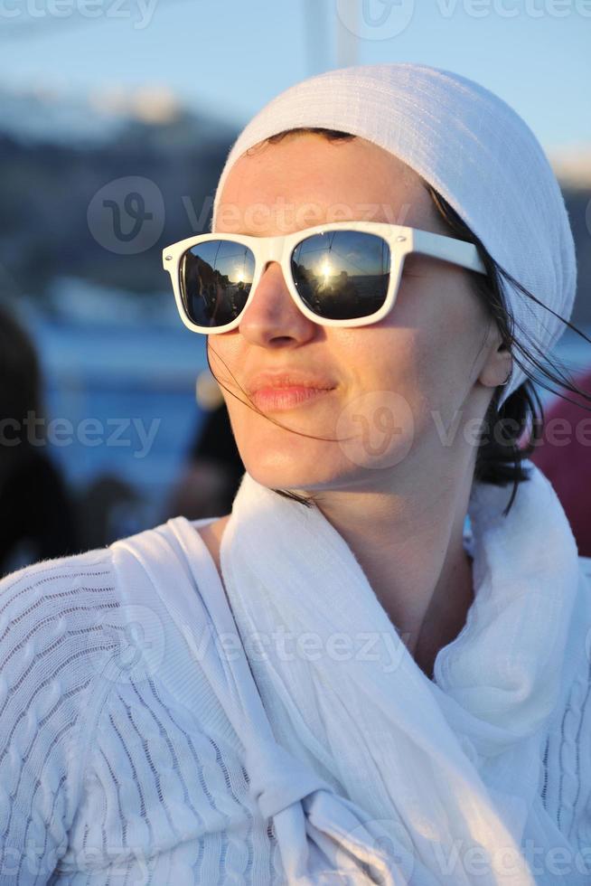 Greek woman on the streets of Oia, Santorini, Greece photo