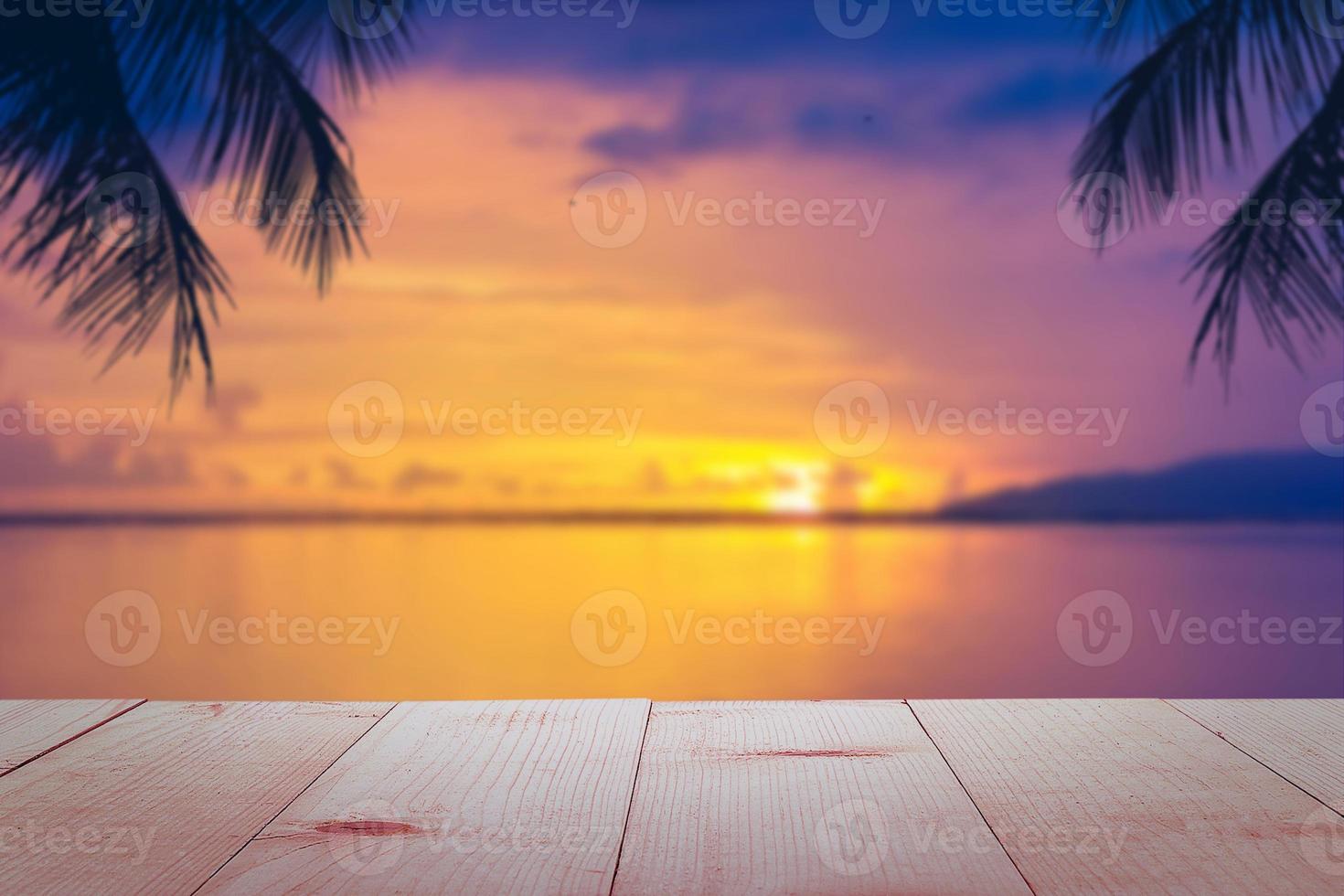 wooden table and sea at sunset nature background photo