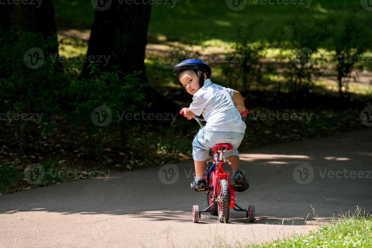 grandfather and child have fun  in park photo