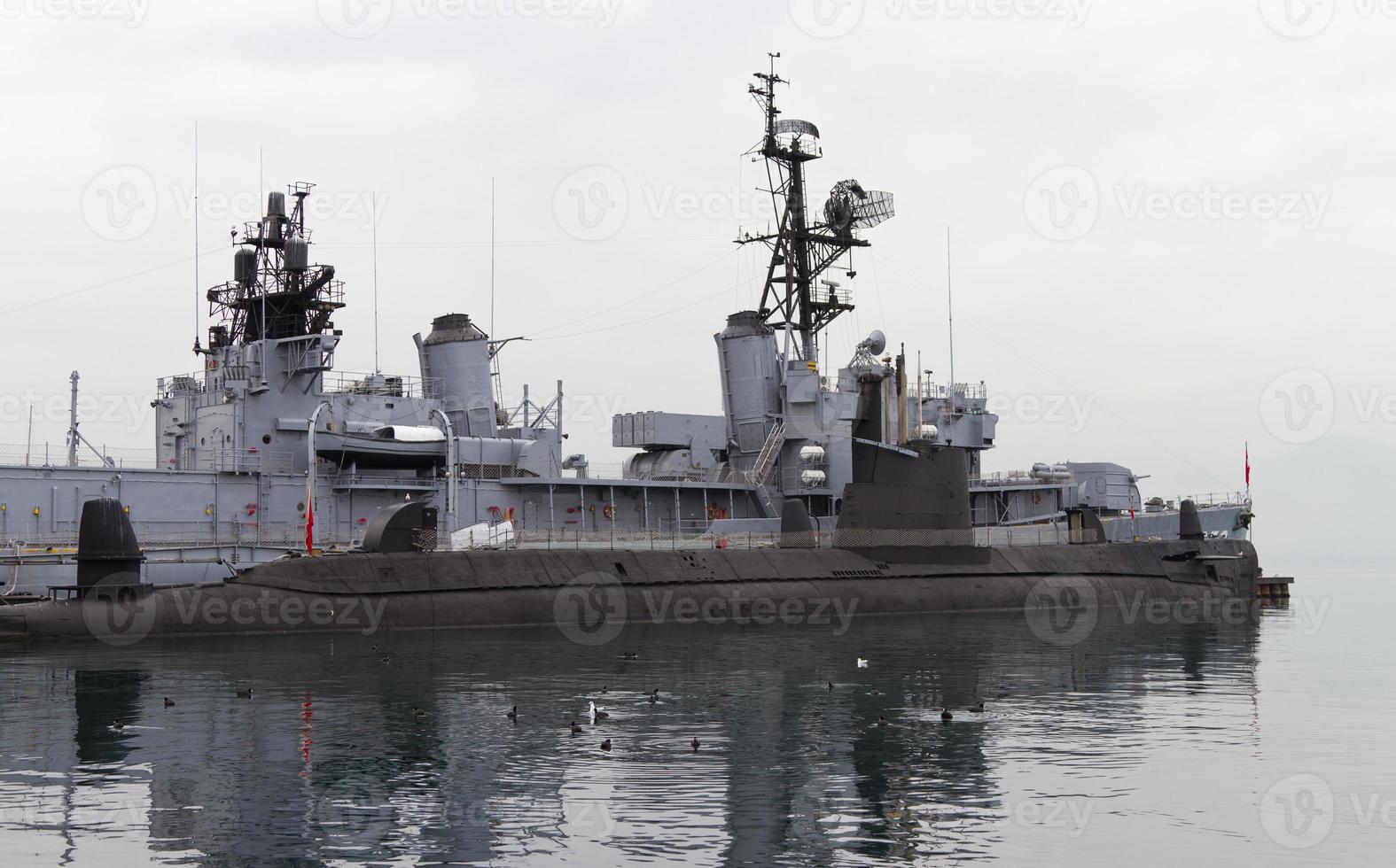 A Submarine and a Warship photo