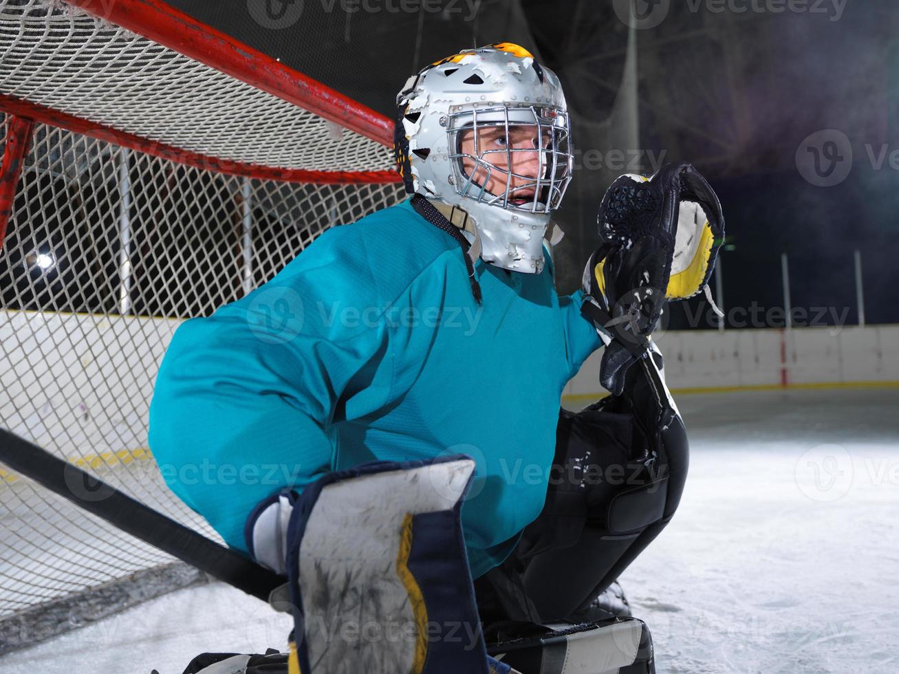 portero de hockey sobre hielo foto