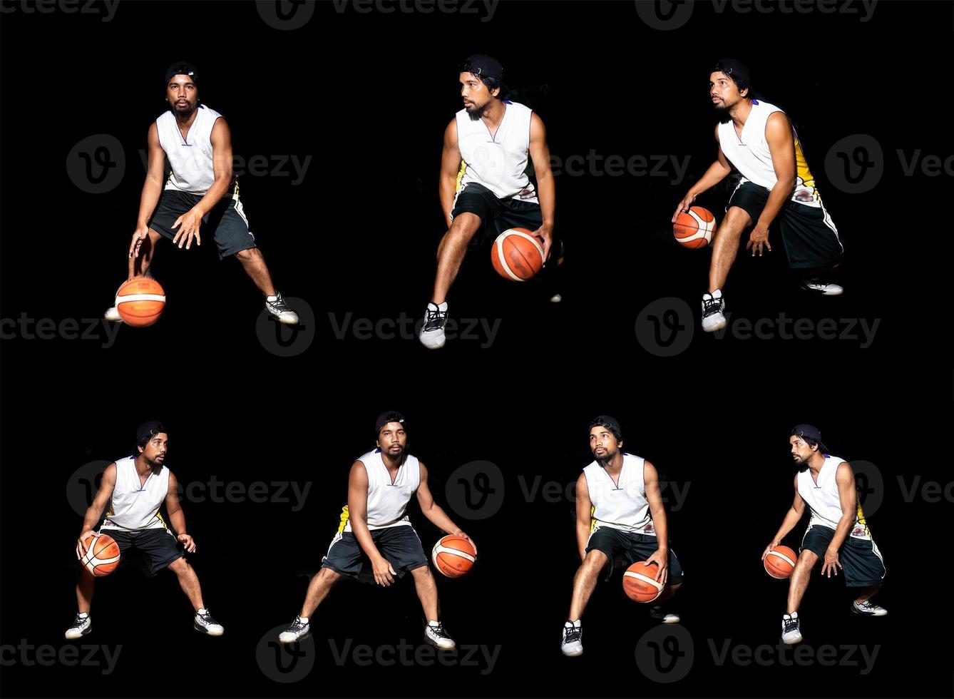 Gesture of Asian basketball player dribbling on black background