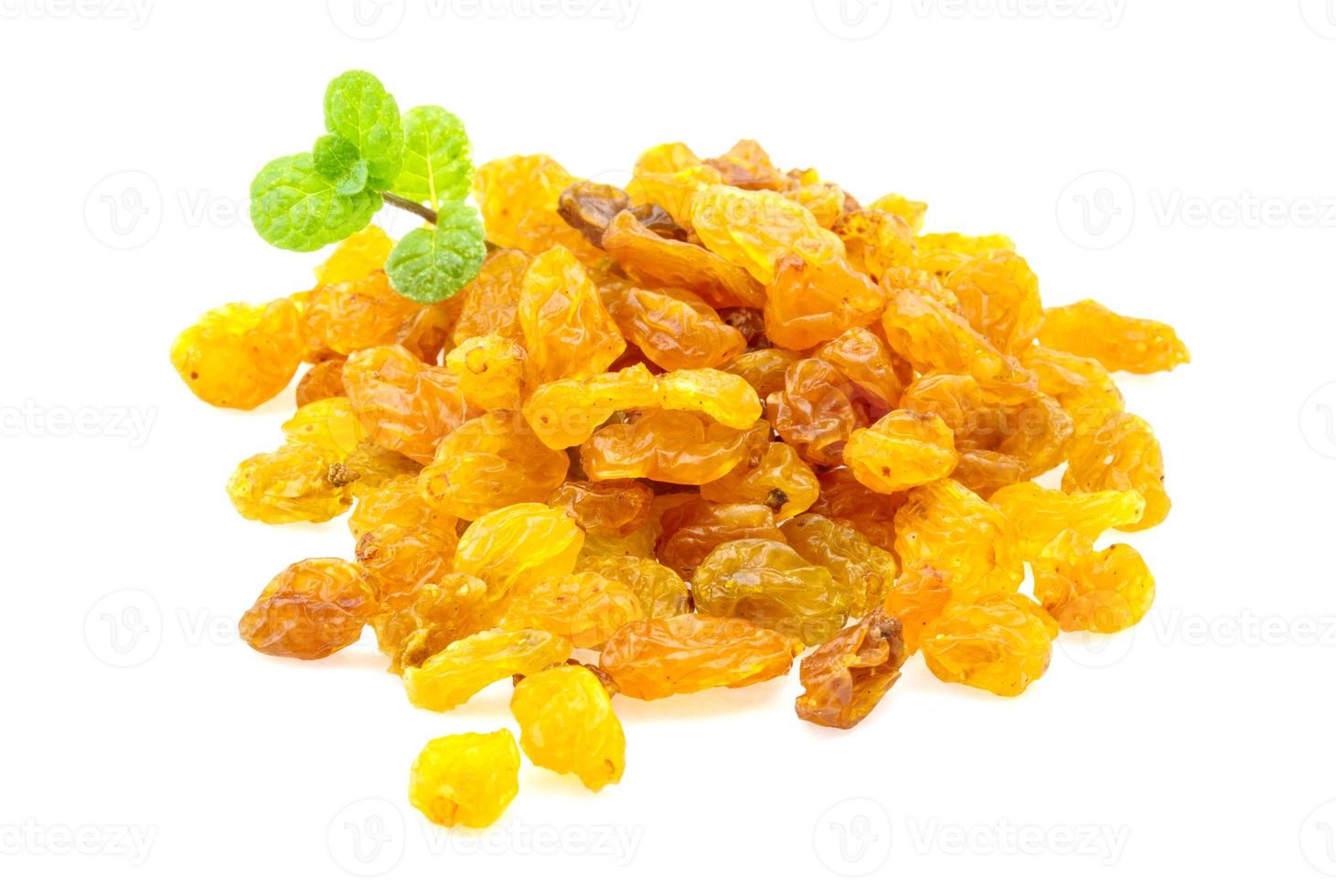 Raisin heap on white background photo