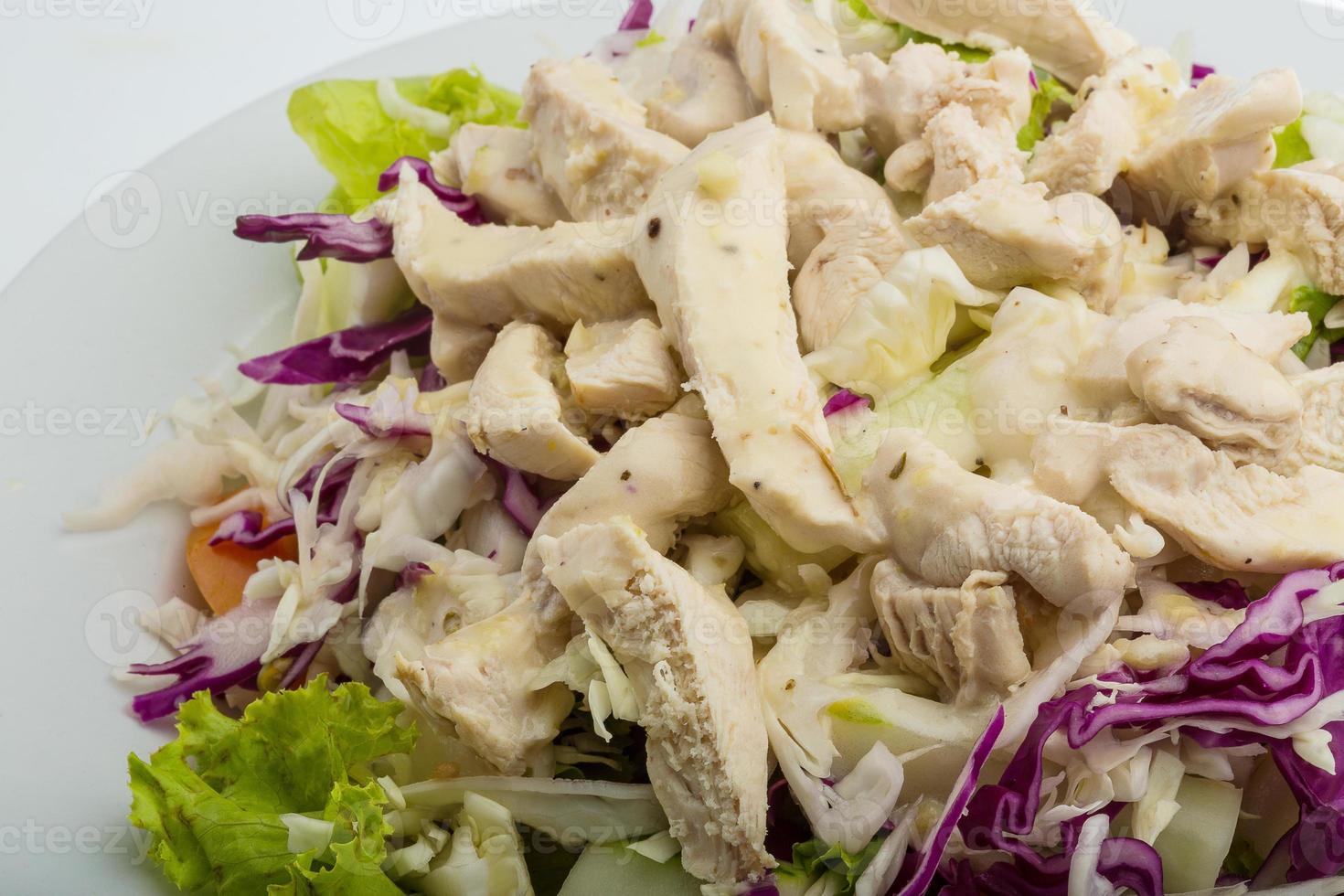 Chicken salad on the plate photo