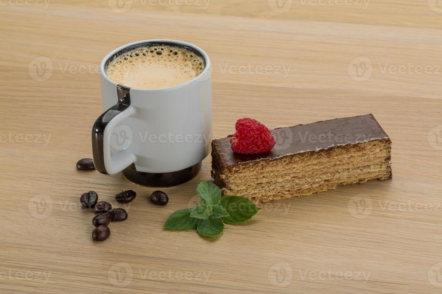 Coffee with cake on wooden background photo