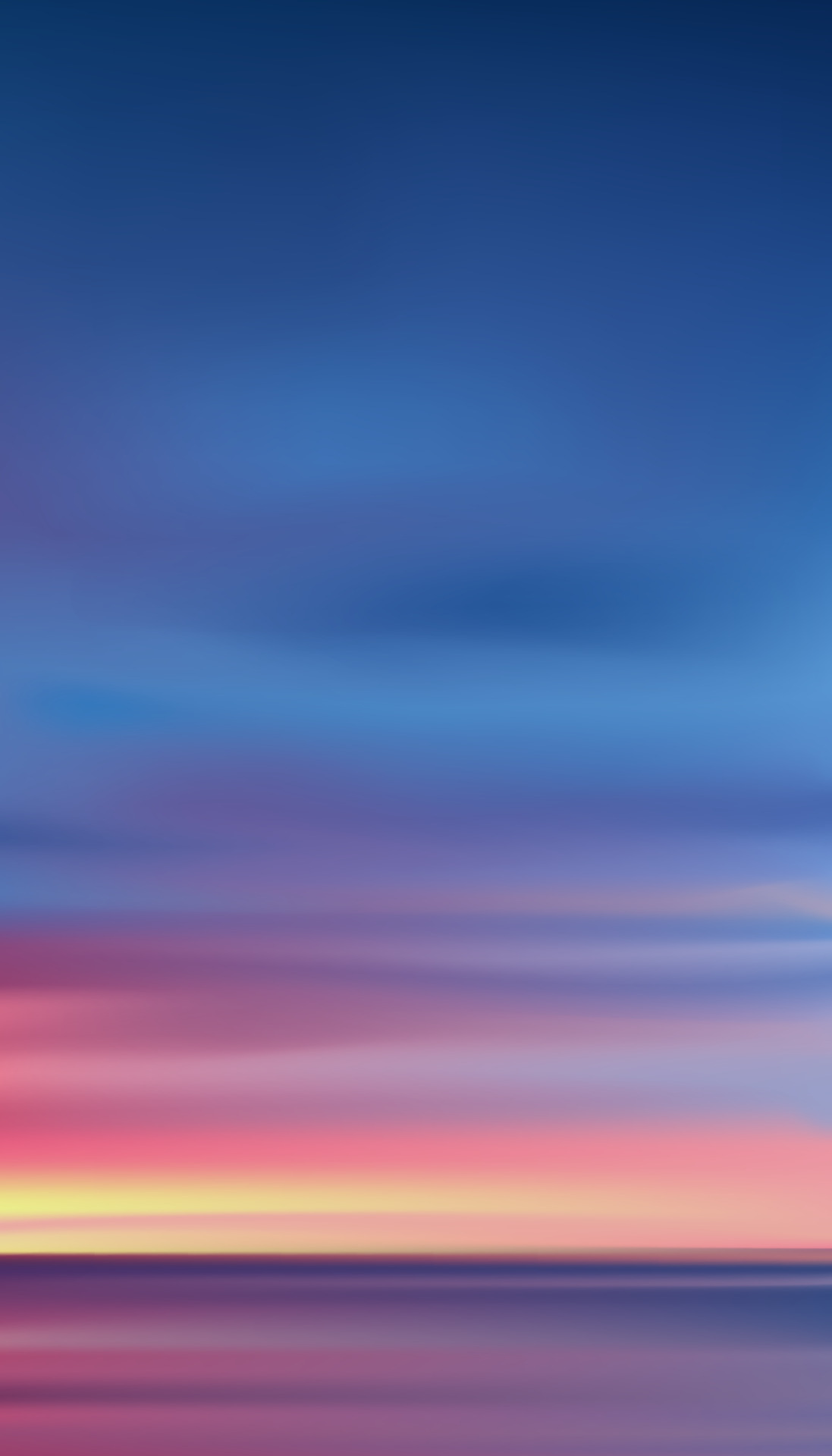 Sunset in evening with Orange,Yellow,Pink and Blue sky,Vertical