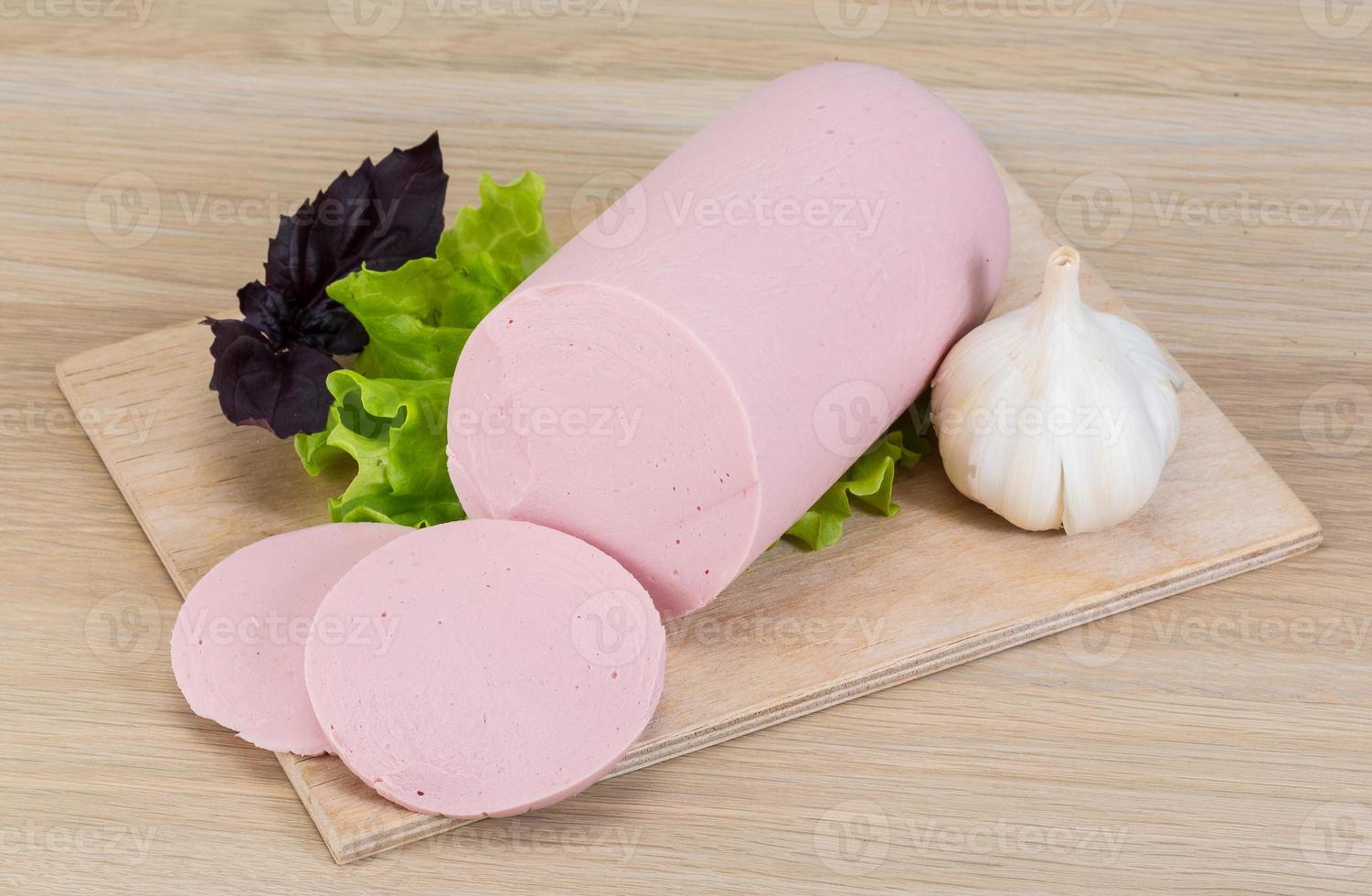 Cooked bologna sausage 10865716 Stock Photo at Vecteezy