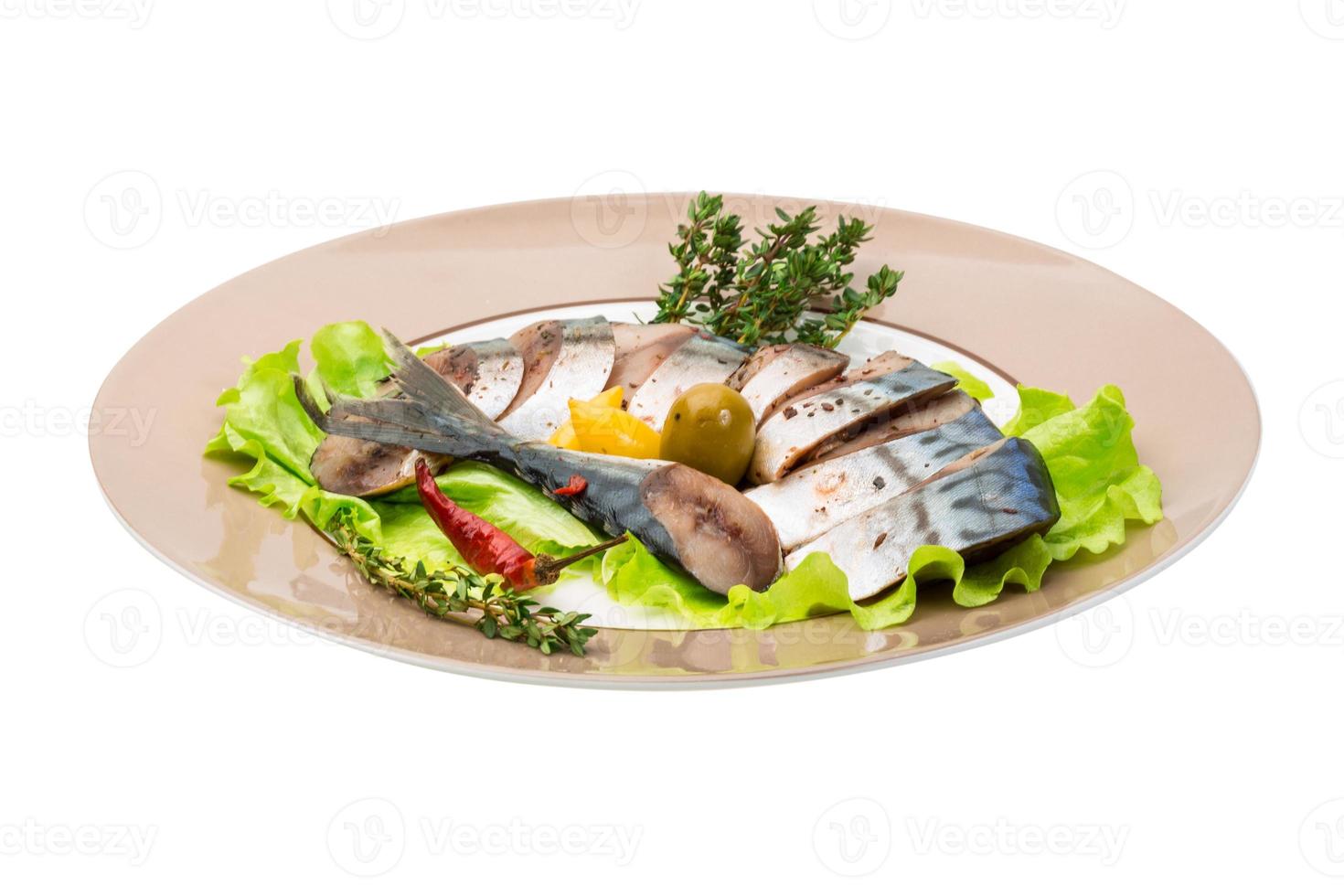 Mackerels on the plate and white background photo