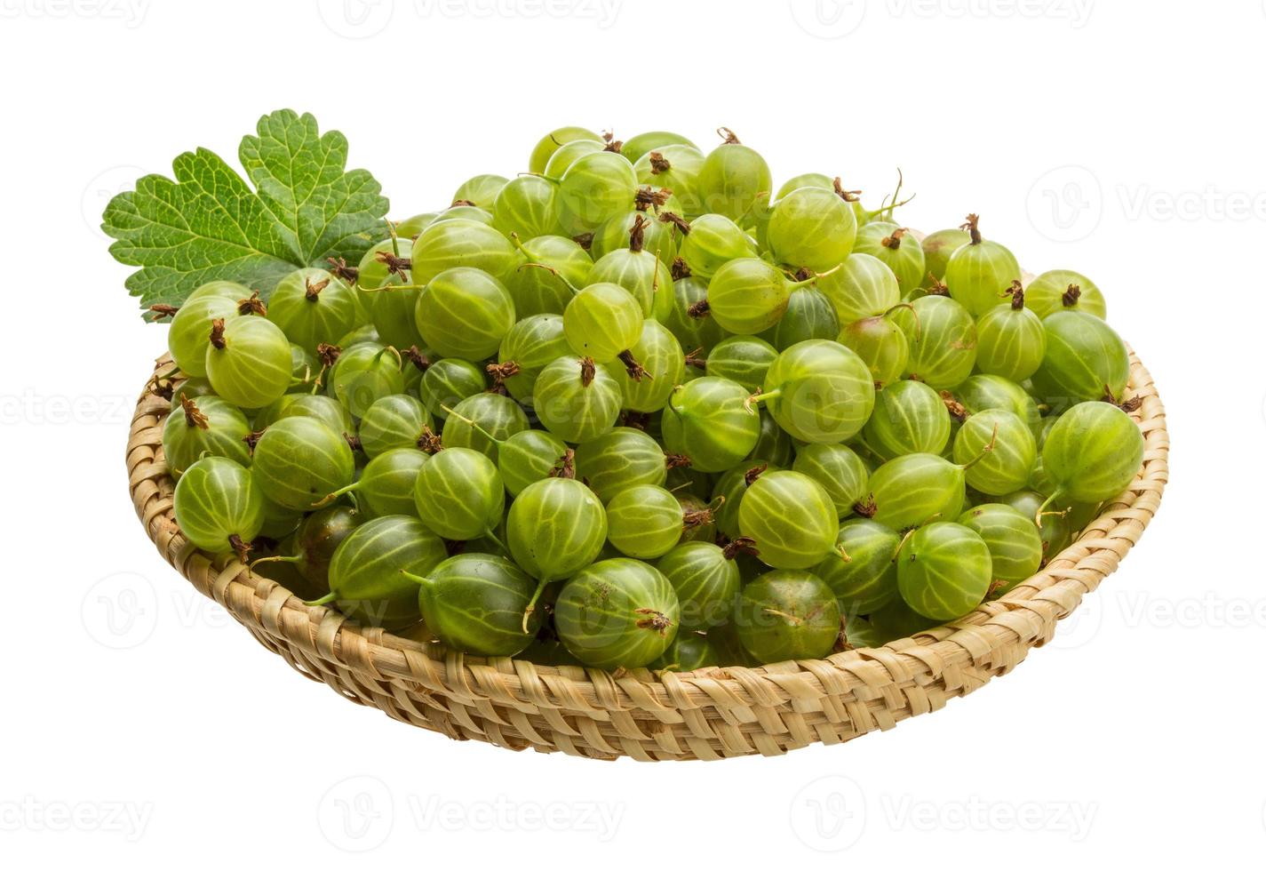 Gooseberry in a basket on white background photo