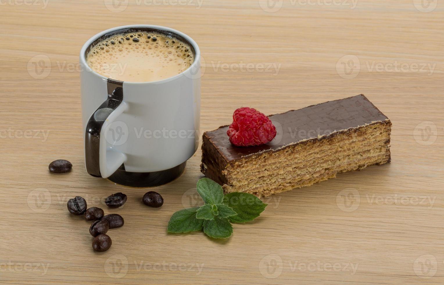 Coffee with cake on wooden background photo