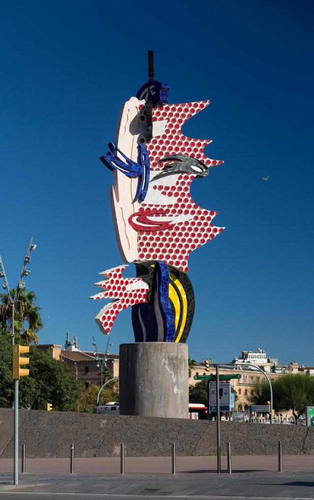 BARCELONA - OCTOBER,28 -  Barcelona head sculpture on October 28, 2012 in Barcelona. This sculpture by the famous American Pop artist Roy Lichtenstein was inaugurated for the 1992 Barcelona games photo