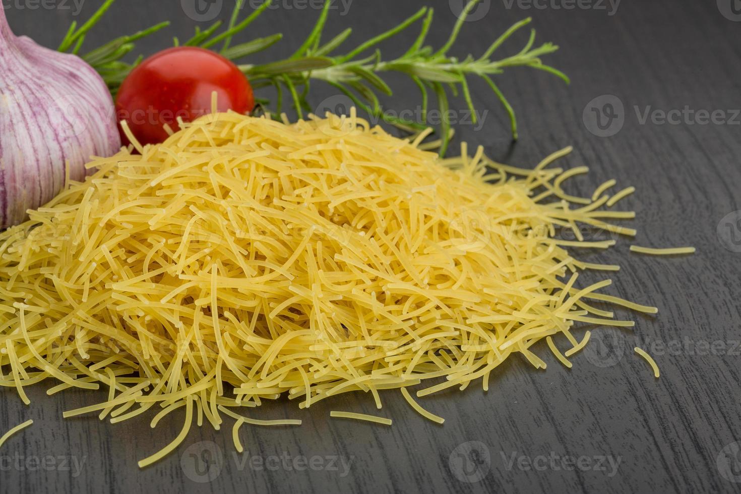 Vermicelli on wooden background 10867394 Stock Photo at Vecteezy