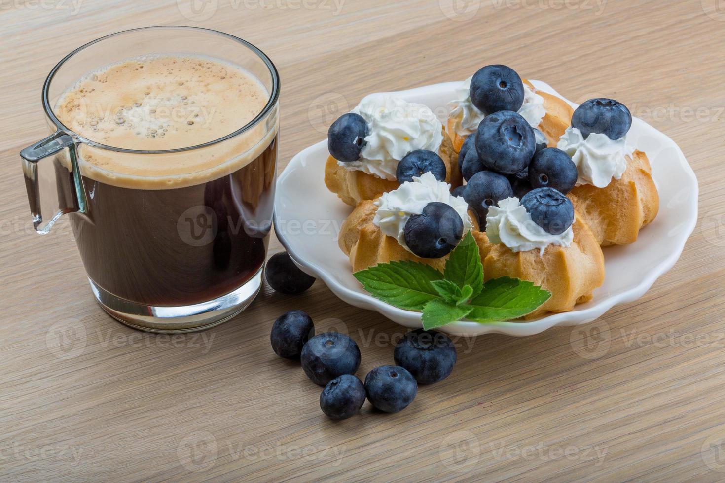 Profiterole with blueberry photo