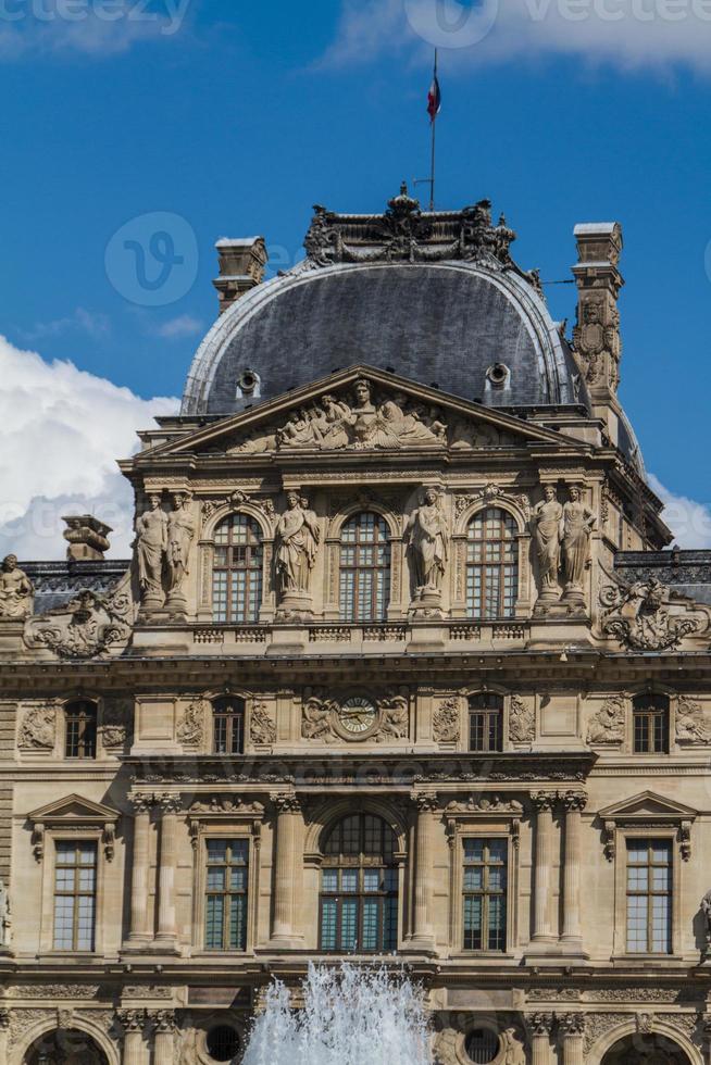 PARIS - JUNE 7 - Louvre building on June 7, 2012 in Louvre Museum, Paris, France. With 8.5m annual visitors, Louvre is consistently the most visited museum worldwide. photo