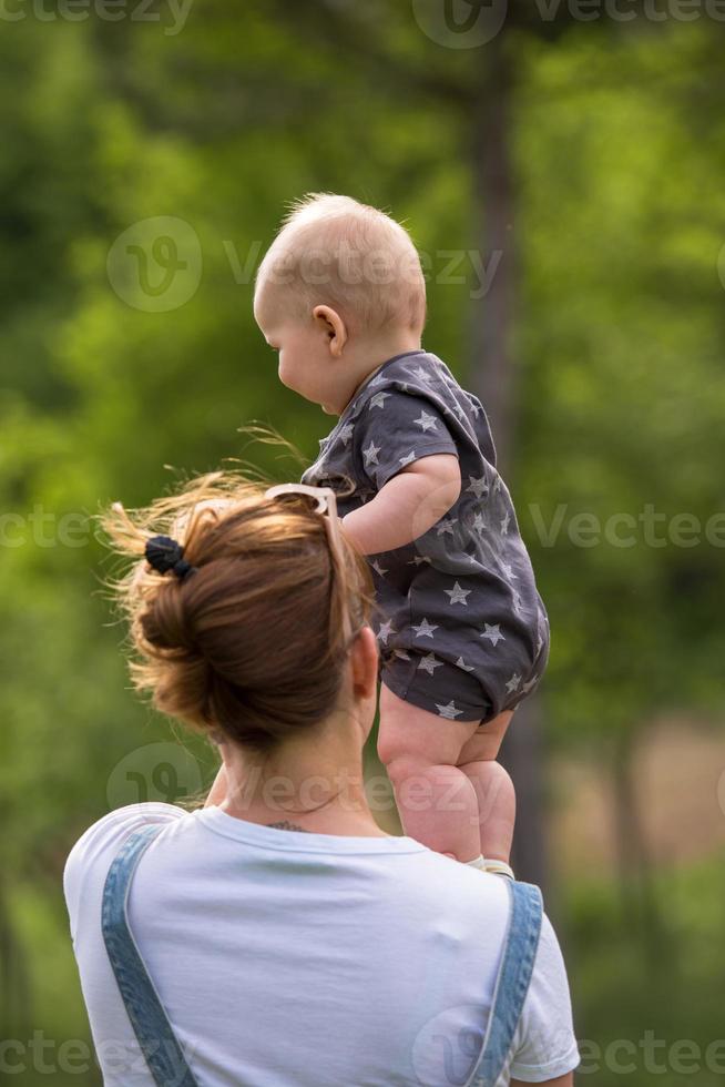 woman with baby  in nature photo