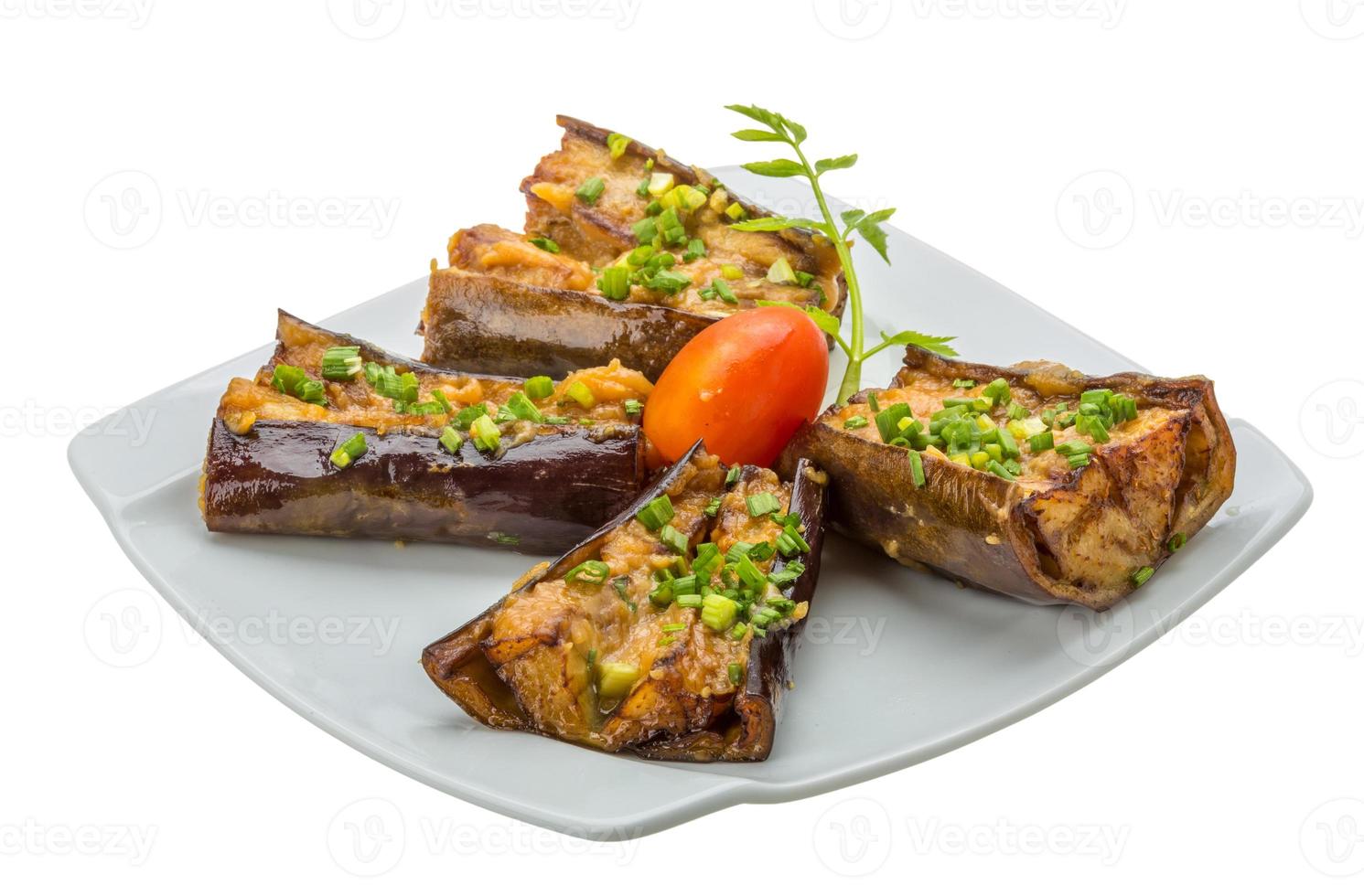 Grilled eggplant on the plate and white background photo