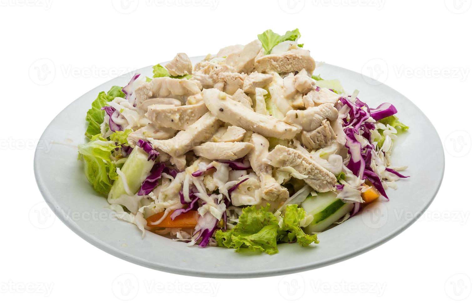 Chicken salad on the plate and white background photo