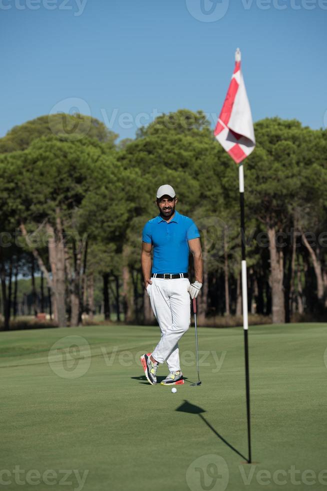 golf player portrait at course photo