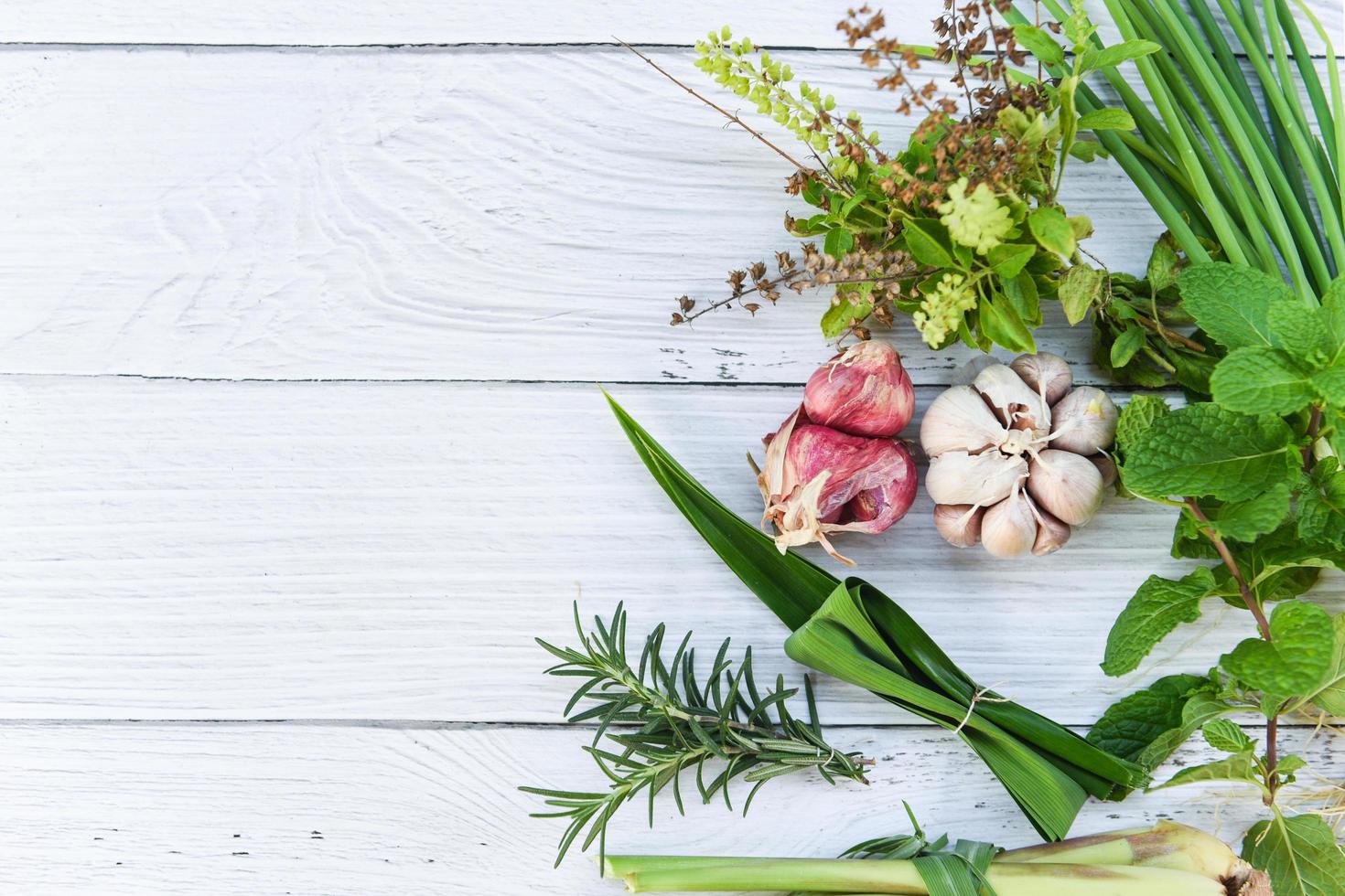 kitchen herb garden concept - Natural fresh herbs and spice on rustic wood background in the kitchen for ingredient food photo