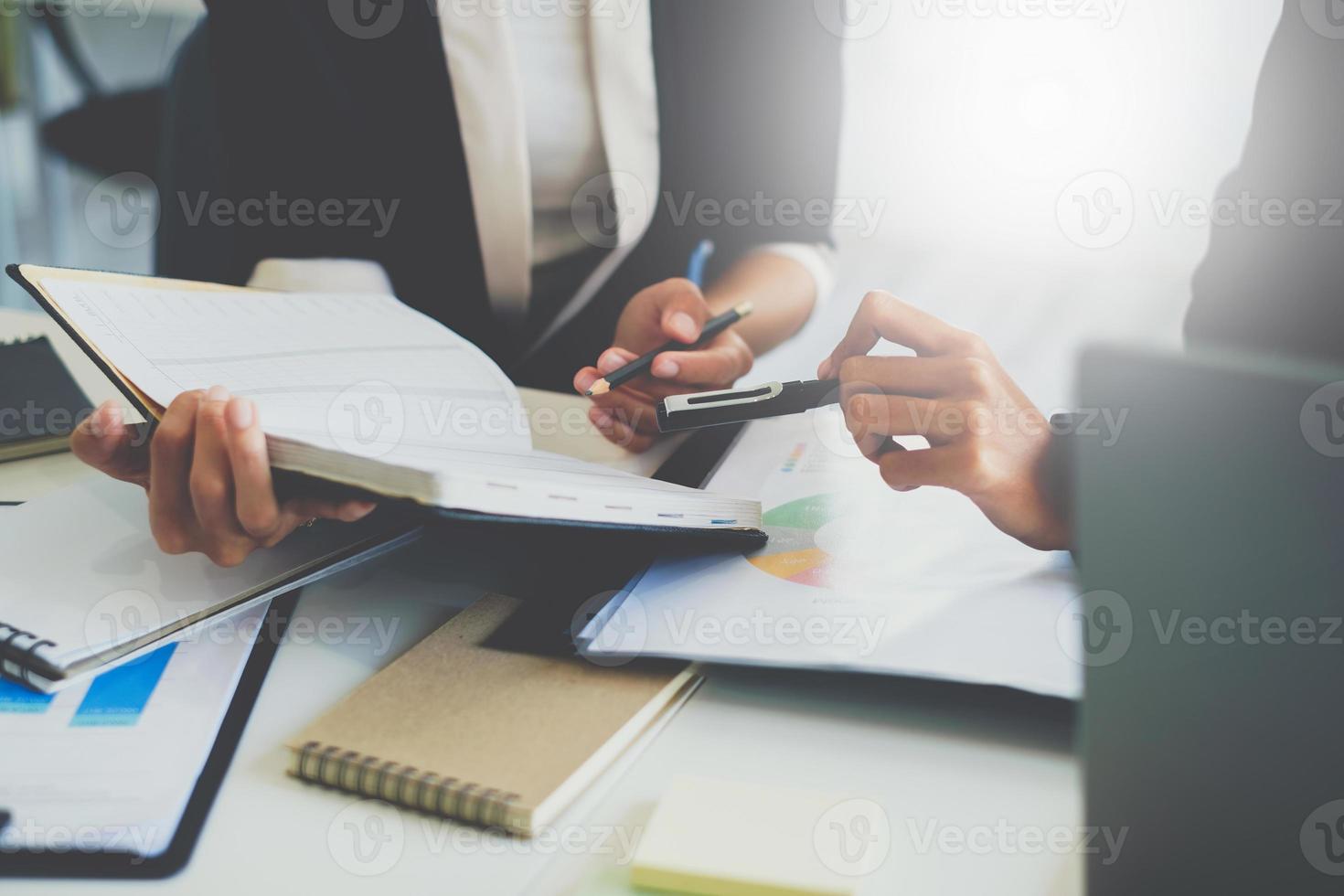 Group of Business people and Accountant checking data document on digital tablet for investigation of corruption account . Anti Bribery concept photo