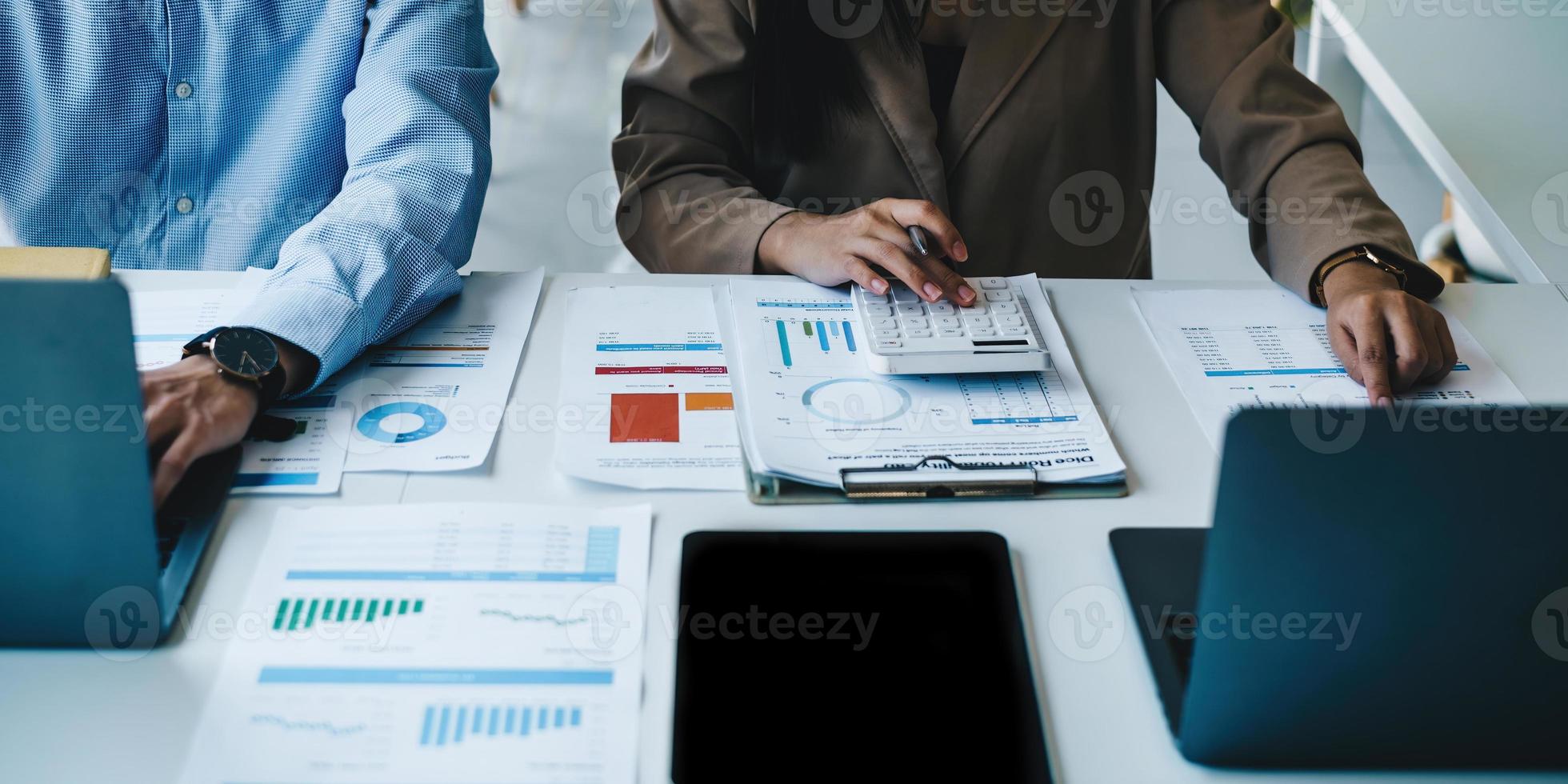 Image of Audit team working together and looking about transaction for corruption of company. Finance budget concept. photo