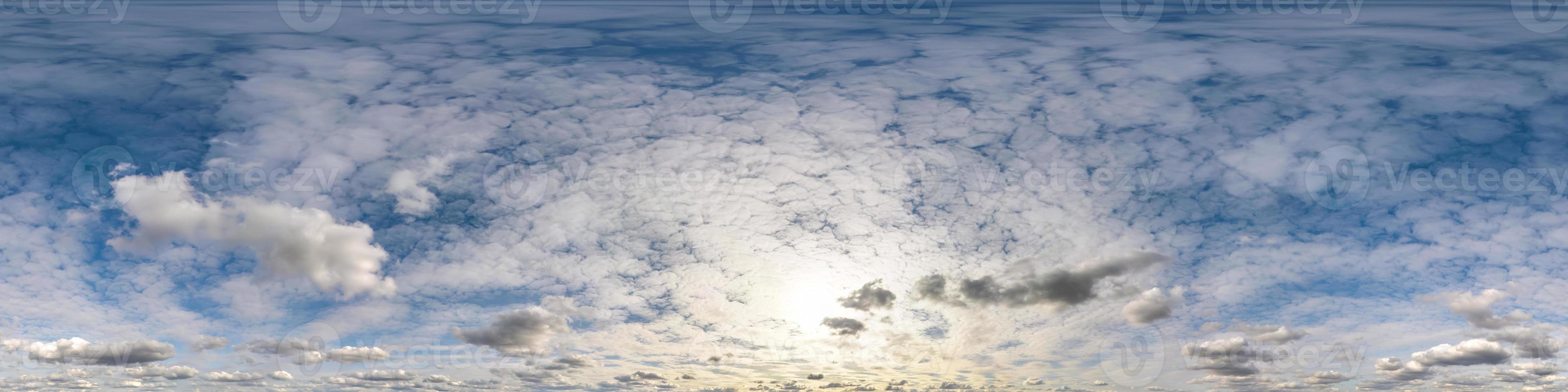 blue sky hdr 360 panorama with white beautiful clouds in seamless projection with zenith for use in 3d graphics or game development as sky dome or edit drone shot for sky replacement photo