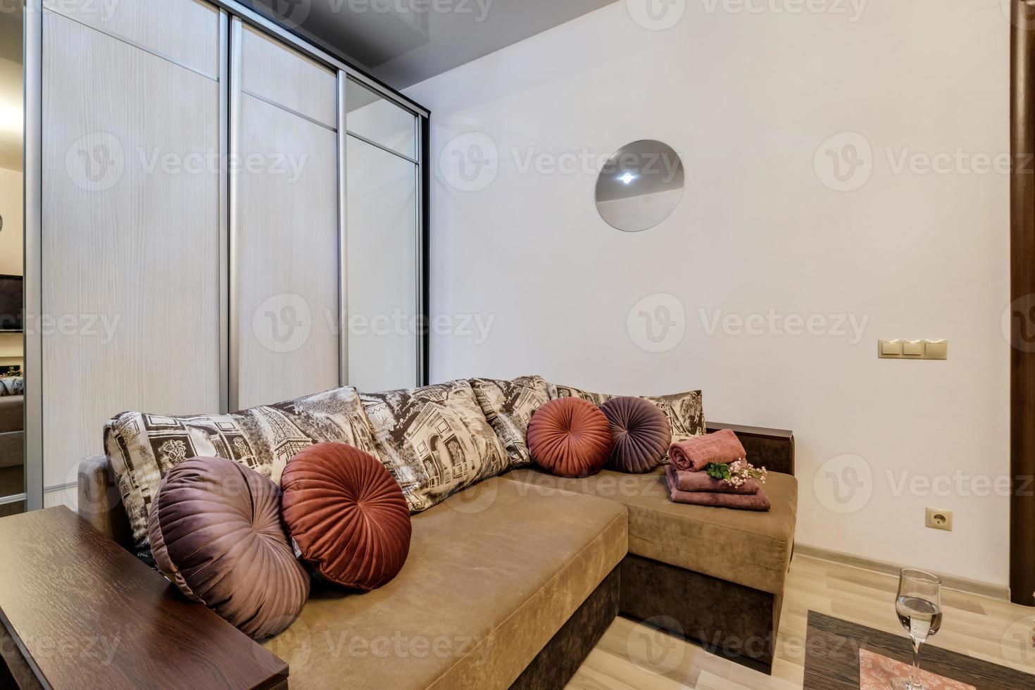 Interior of modern luxure living room in studio apartments in light pink color style photo