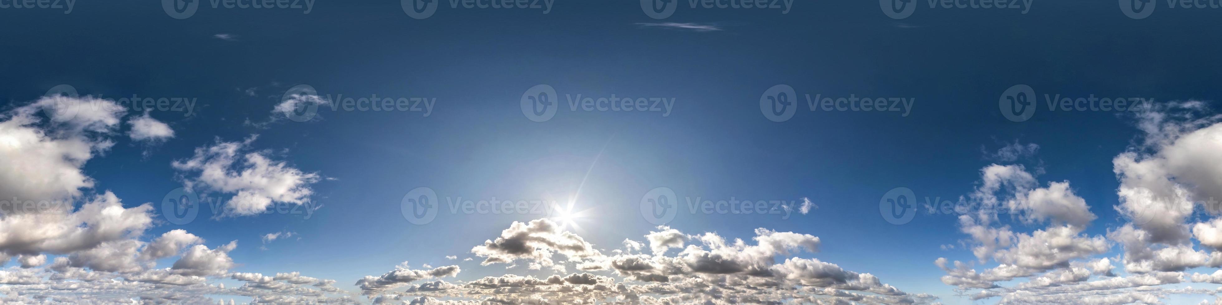 Seamless hdri panorama 360 degrees angle view blue sky with beautiful cumulus clouds with zenith for use in 3d graphics or game development as sky dome or edit drone shot photo