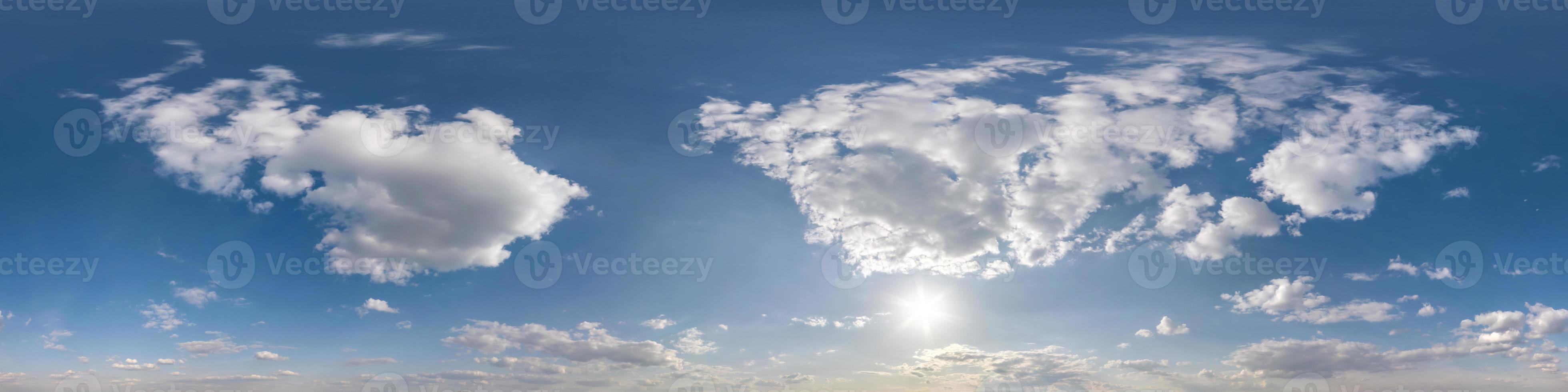 hdri 360 panorama of blue sky with white beautiful clouds. Seamless panorama with zenith for use in 3d graphics or game development as sky dome or edit drone shot for sky replacement photo