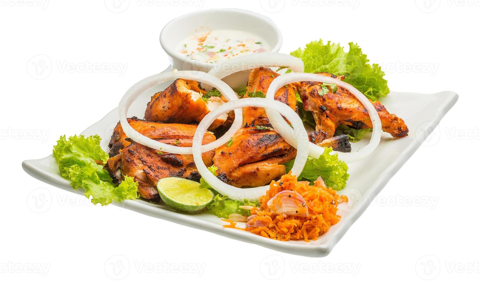 Tandori Chicken on the plate and white background photo