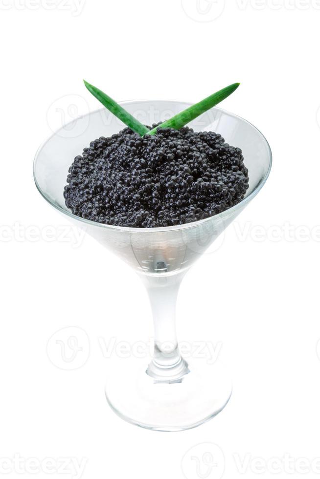 Black caviar on white background photo