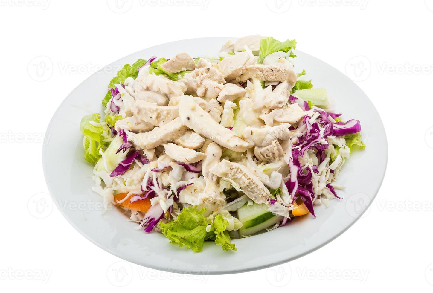 Chicken salad on the plate and white background photo