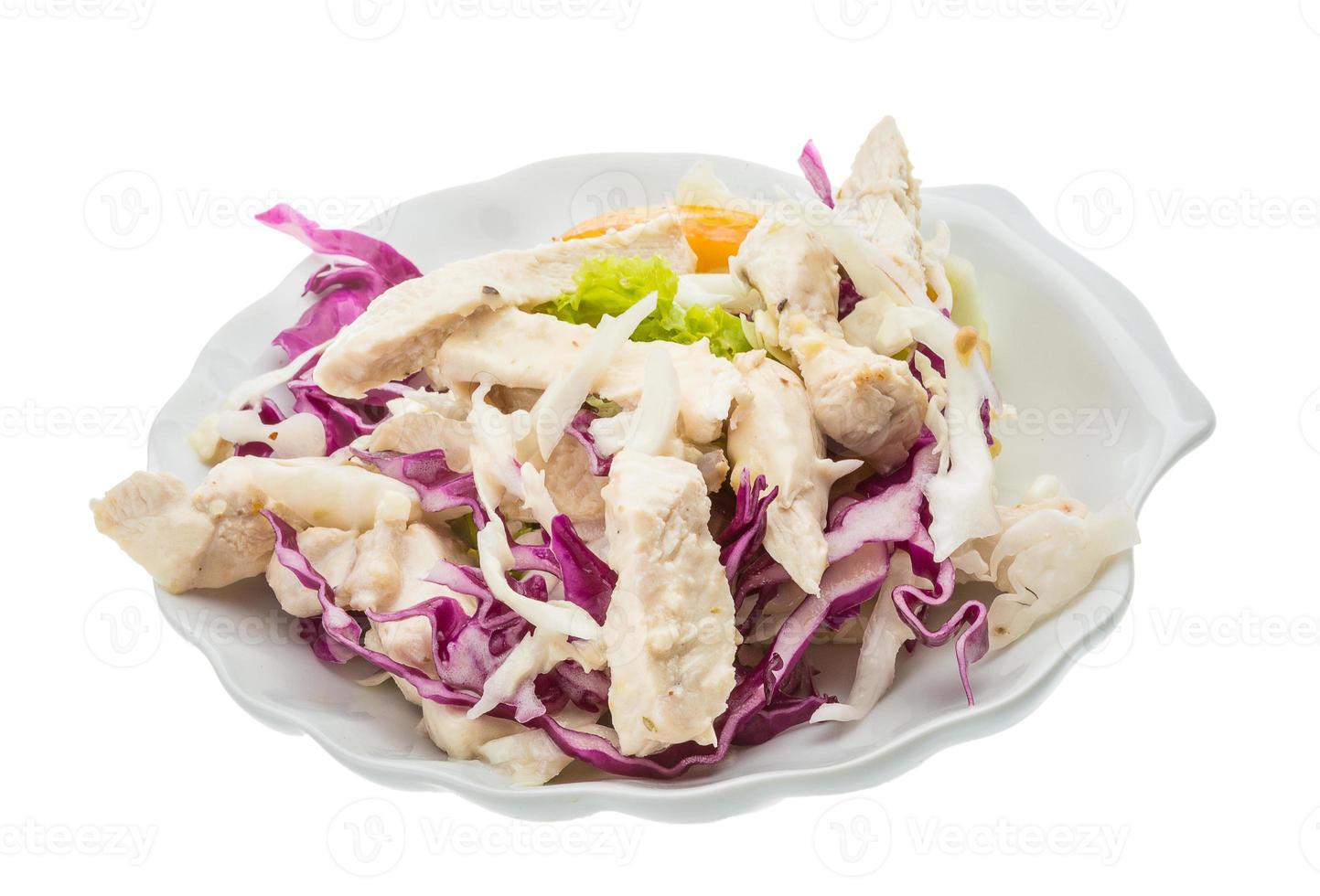 Chicken salad on the plate and white background photo