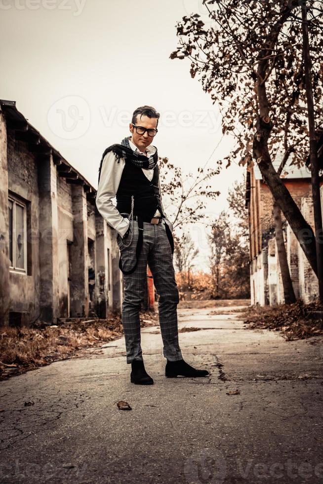 Below view of well dressed confident man outdoors. photo