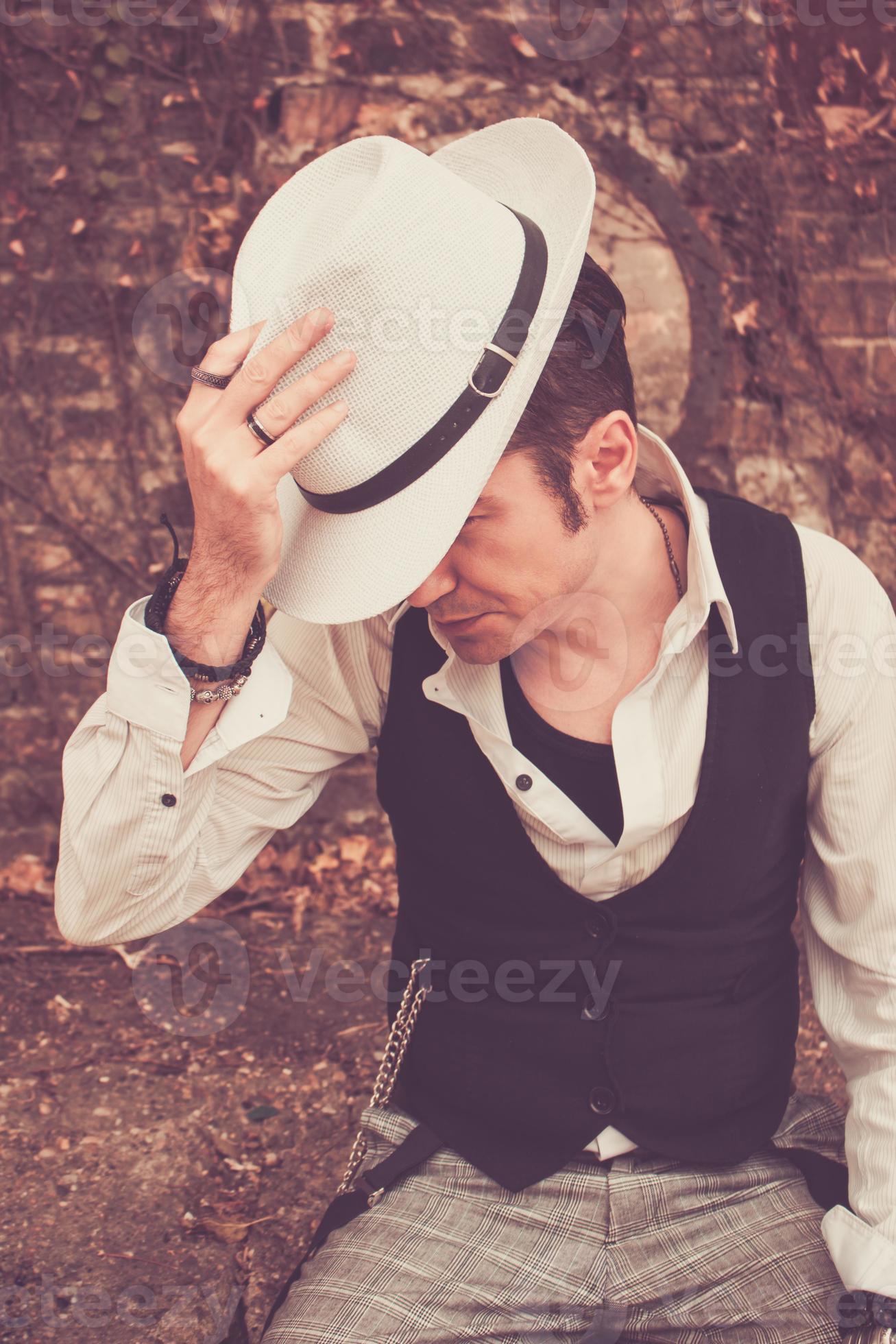 Tipping fedora hat. 10908862 Stock Photo at Vecteezy