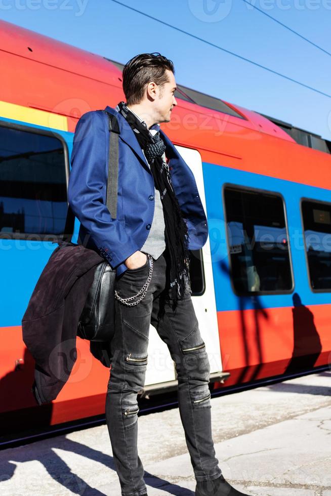 Below view of a businessman at train station. photo
