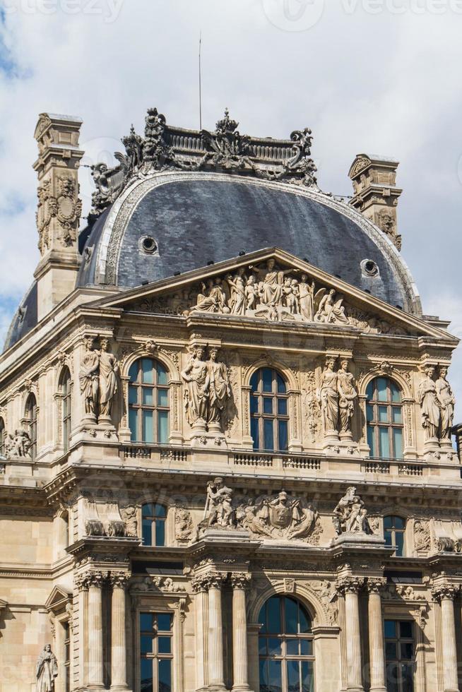 PARIS - JUNE 7 - Louvre building on June 7, 2012 in Louvre Museum, Paris, France. With 8.5m annual visitors, Louvre is consistently the most visited museum worldwide. photo