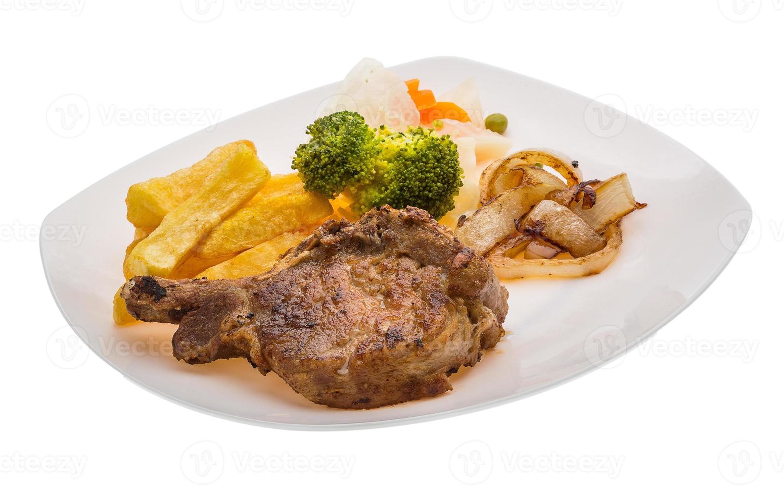 T-bone steak on the plate and white background photo