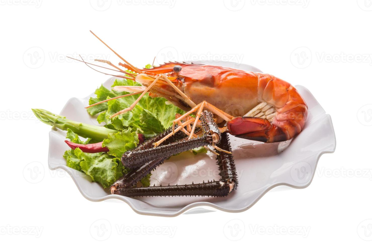 Giant Freshwater Prawn on the plate and white background photo