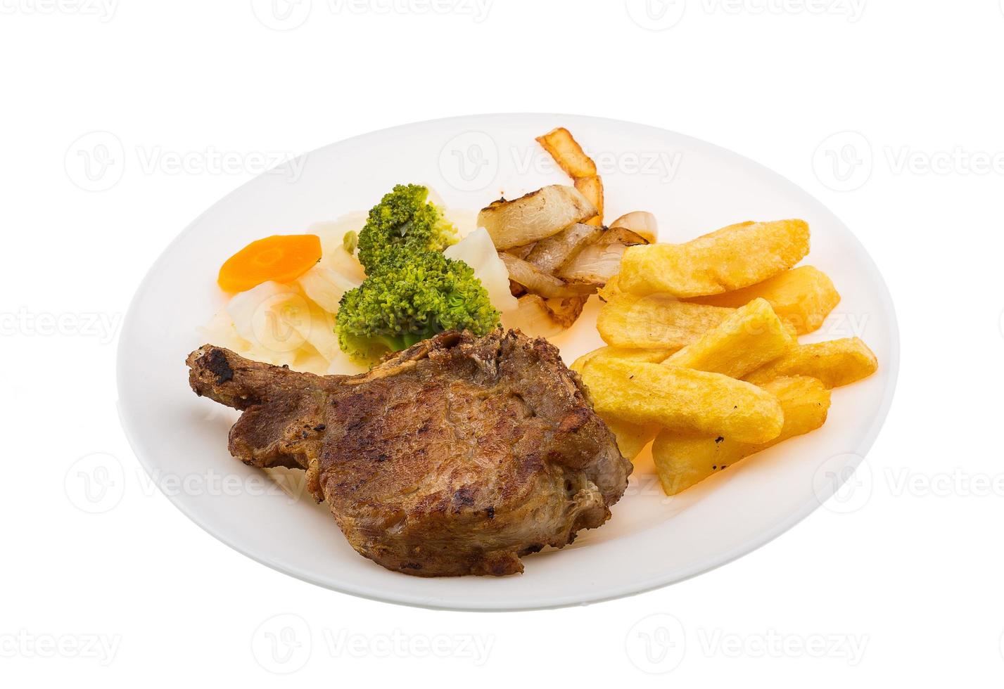 T-bone steak on the plate and white background photo