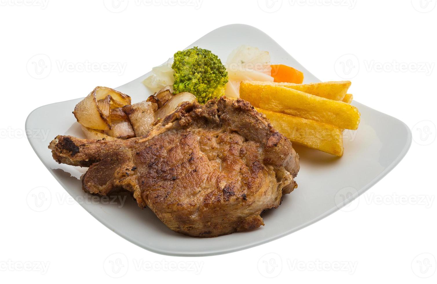 T-bone steak on the plate and white background photo