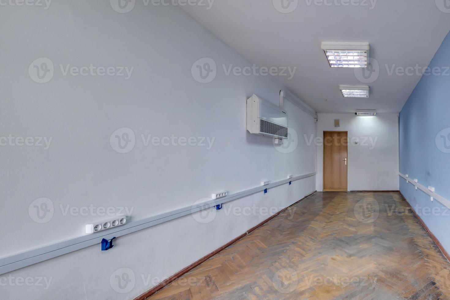 empty white room with repair and without furniture. room for office or clinic photo