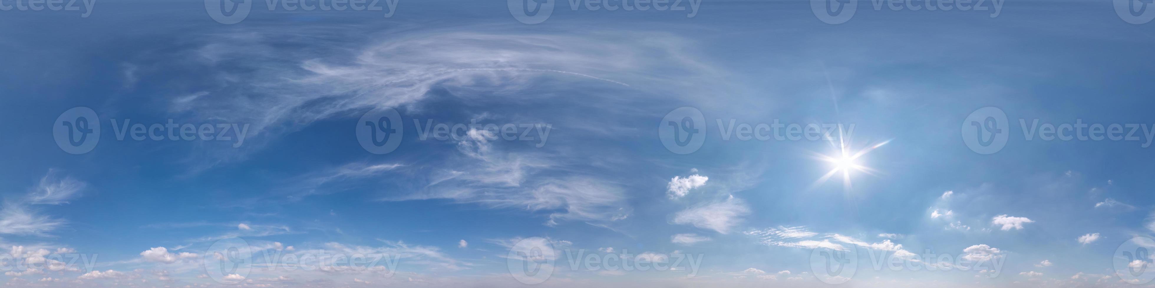Seamless clear blue sky hdri panorama 360 degrees angle view with beautiful clouds  with zenith for use in 3d graphics or game as sky dome or edit drone shot photo
